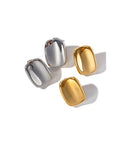 Sculptural gold or silver statement stud earrings with smooth curved design in 18k gold plated stainless steel