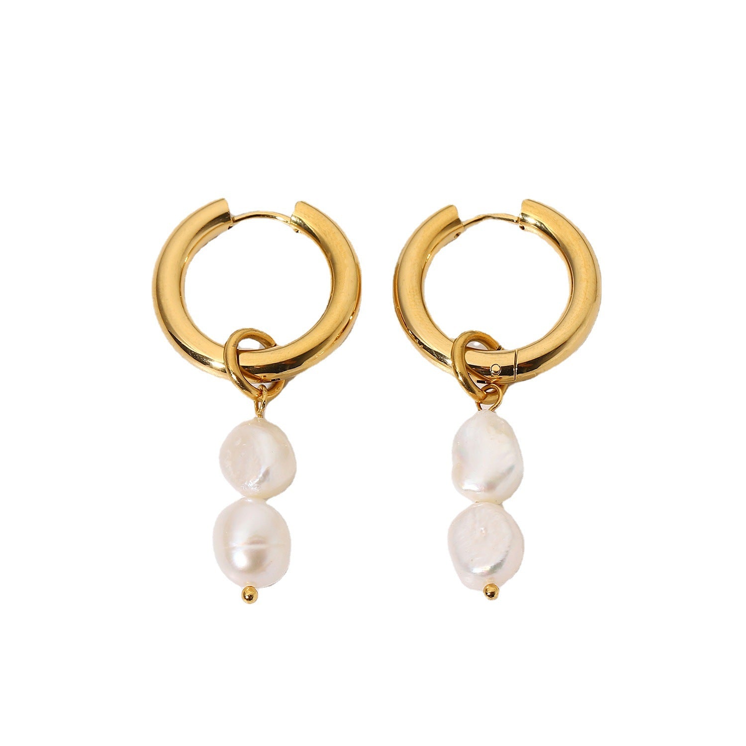 Gold hoop earrings with dangling pearls on white background