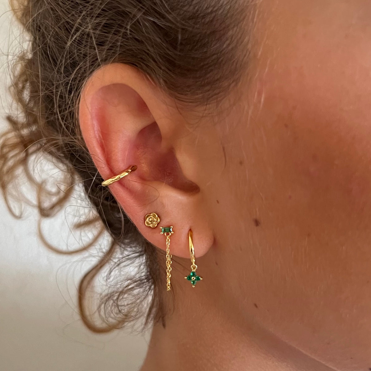 Stainless steel 18k gold plated 16g 6mm dainty rose flat back stud on model 
