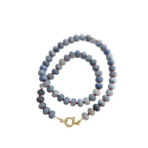 Anya mala-inspired necklace with blue grey natural stone beads and gold spring ring clasp