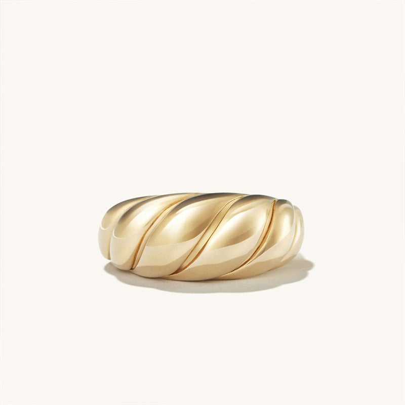 Croissant dome ring in gold with a rounded, twisted silhouette and high polish finish
