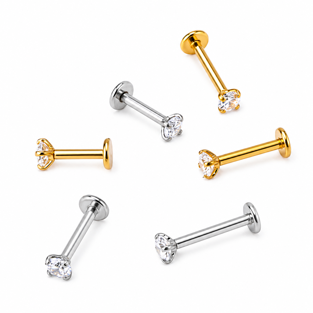 Gold and Silver CZ flat back studs in stainless steel showing 6mm 8mm and 10mm sizes