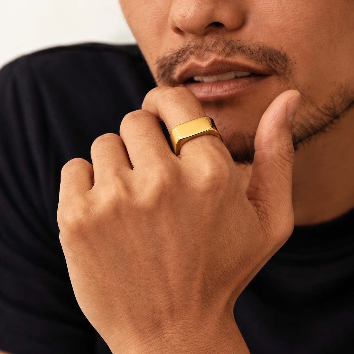 18k gold plated stainless steel signet ring with polished finish on neutral background