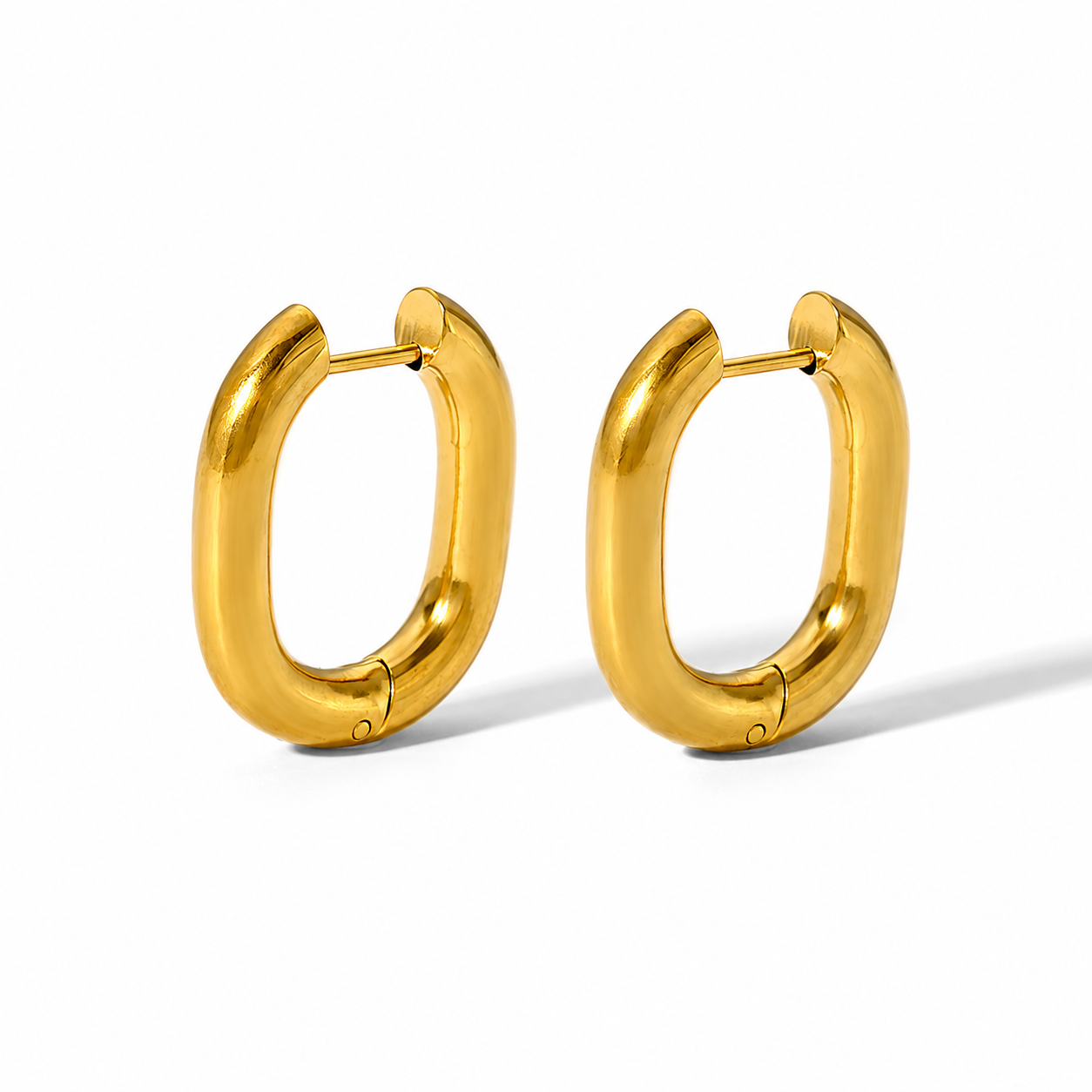 Olivia Huggie Earrings in waterproof gold featuring a modern U shaped hoop design for everyday wear.