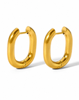 Olivia Huggie Earrings in waterproof gold featuring a modern U shaped hoop design for everyday wear.
