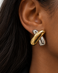 Black woman wearing Paloma Mixed Metal Statement Earrings in 18k gold plated and polished stainless steel