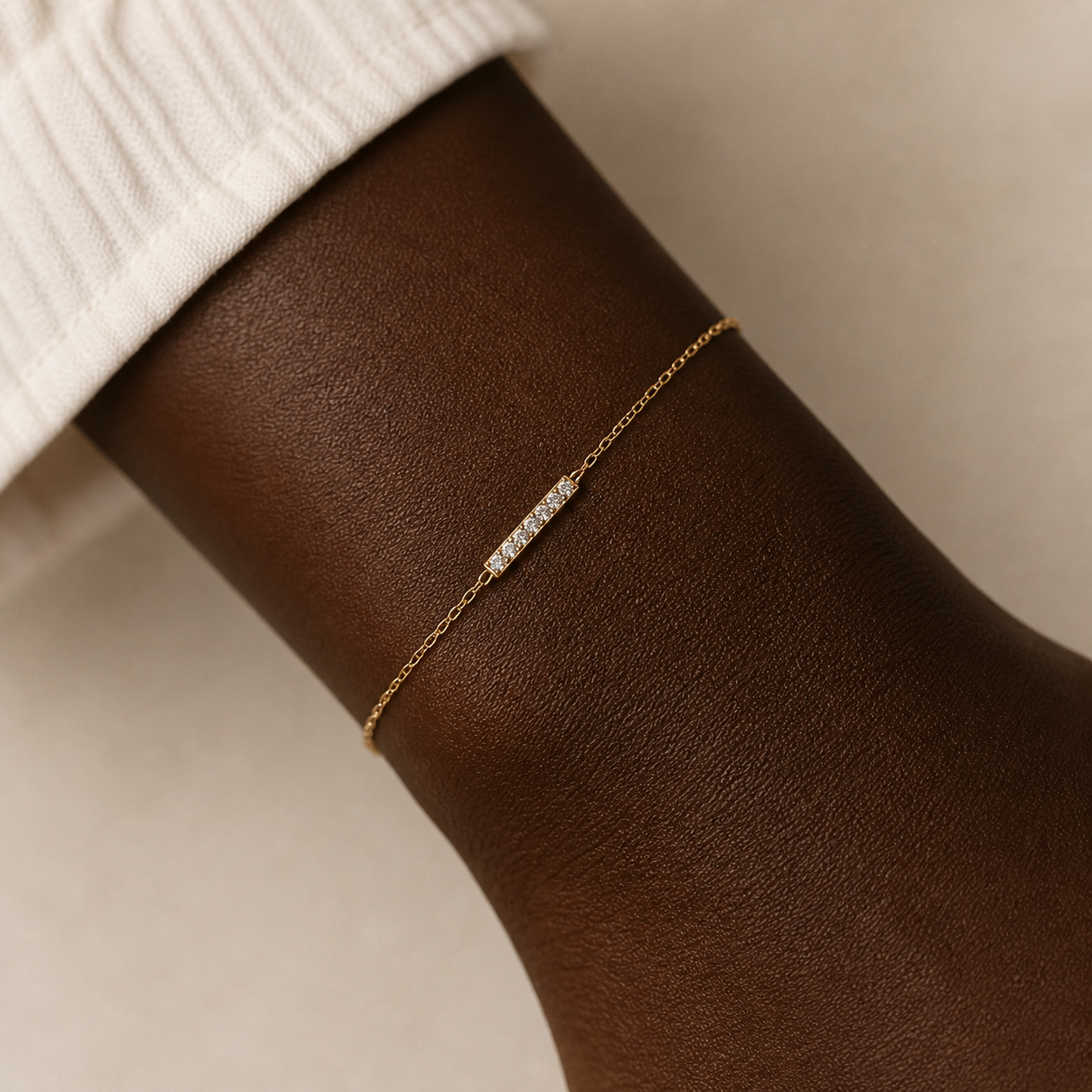 dainty pave bar bracelet gold plated sterling silver on medium dark skin cubic zirconia minimal chain