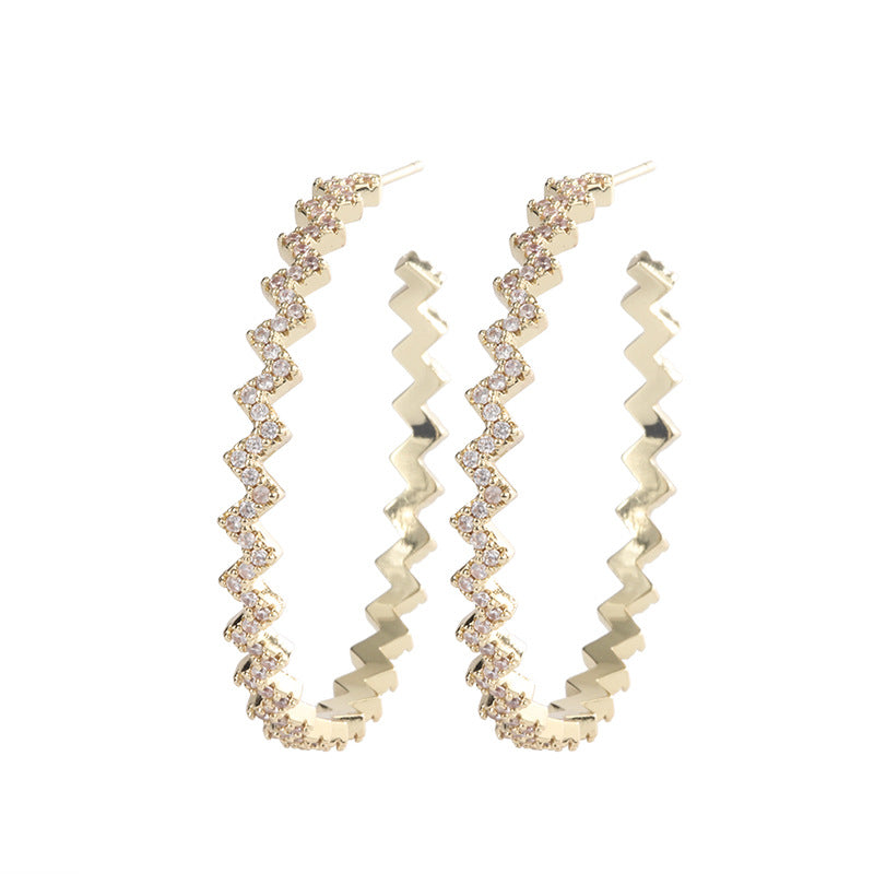 Gold zigzag hoop earrings with pavé stones, modern geometric statement hoops