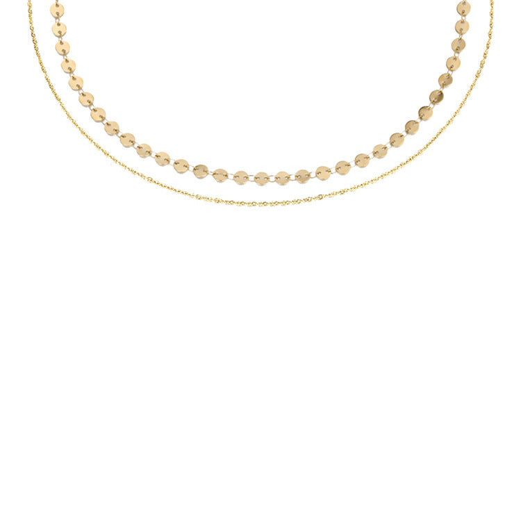 Gold disc necklace in titanium steel with tiny connected discs and cable chain, lightweight layering necklace inspired by Barbados sun