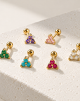 Multicolor Trinity CZ flat back studs in gold with clear, green, turquoise, pink and purple stones