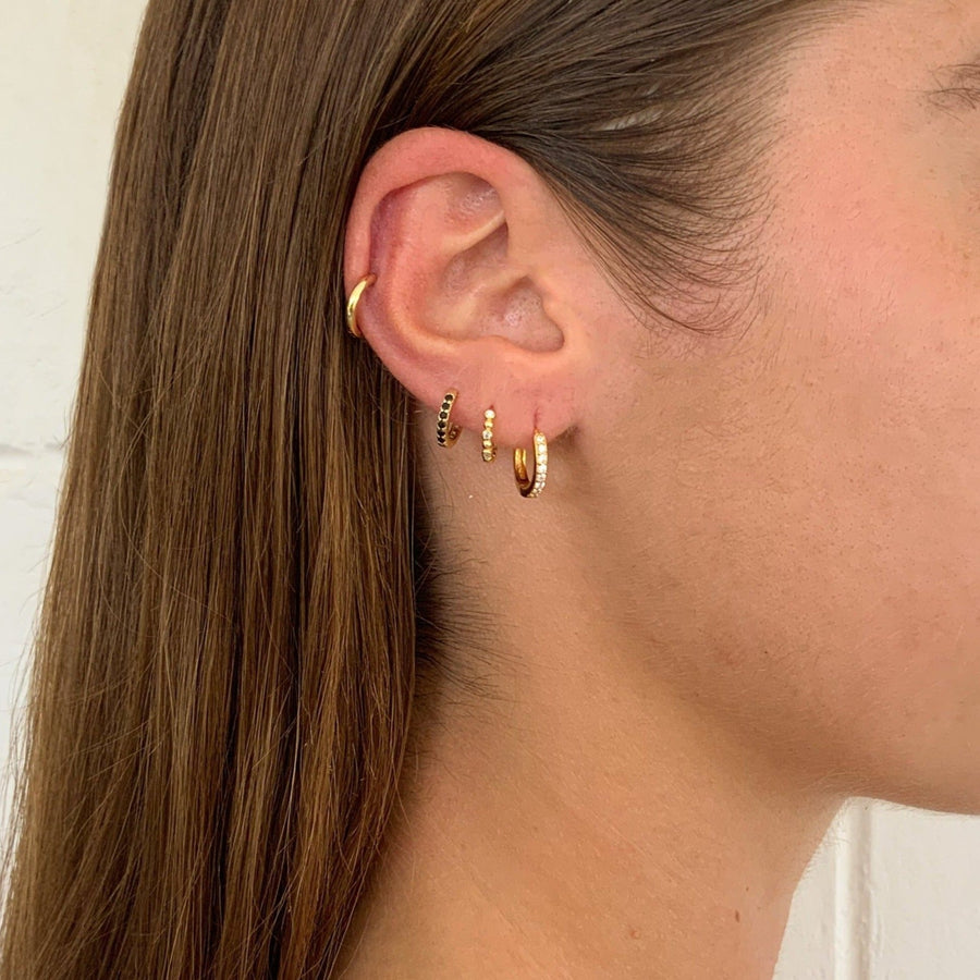 Amelia Gold plated crystals huggie earrings whatnotz.com