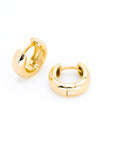 Chunky baby huggie earrings in polished gold plated  with a smooth rounded finish, small hoop design, minimal everyday stackable earrings